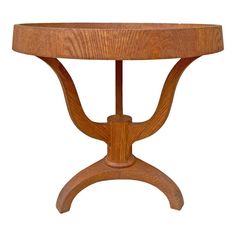 a wooden table with a circular top