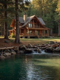 a log cabin sits on the shore of a lake