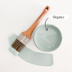 a paintbrush and bowl with the words elegance painted on it next to each other