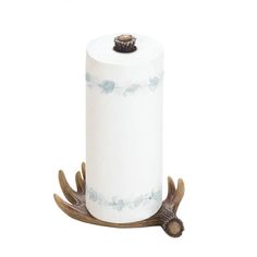 a roll of toilet paper with antlers on it