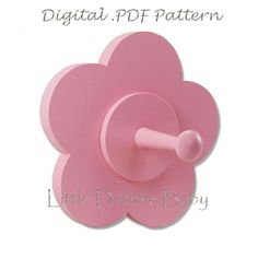 a pink flower shaped object is shown with the words digital, df pattern on it