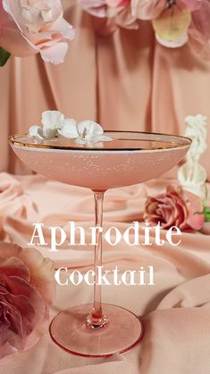 a pink cocktail with white flowers in the background and text above it that reads, aphrrotte cocktail