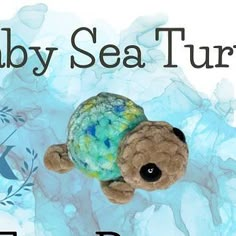 a teddy bear with a turtle on its back and the words baby sea turtle written below it