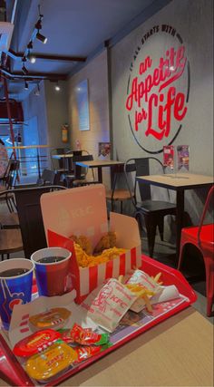 a tray full of food sitting on top of a table