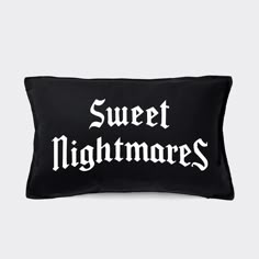 a black pillow with the words sweet nightmares printed in white on it's front