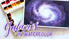 the galaxy is in watercolor and it looks like an art project with paintbrushes