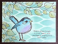 a blue bird sitting on top of a green leafy tree next to a quote