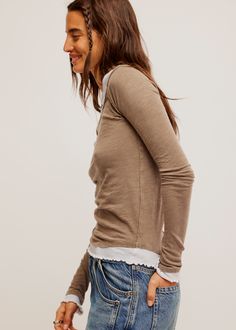 Get that effortlessly layered look with this comfy cotton twofer from We The Free, featuring a wide-neck long sleeve with contrasting details peeking through. Fit: Semi-fitted, longline Features: Comfy cotton jersey fabrication, layered look, wide scoop neckline, crew underlay, exposed seams, lettuce-edge trim, curved hem, contrasting cuffs Why We <3 It: The perfect way to look styled without the extra bulk of multiple layers. We The Free Heritage inspired and lived-in staples. We The Free is an Long Sleeve Layer, Exposed Seams, Crop Top Sweater, Kimono Cardigan, Crop Top Blouse, Romper Dress, Jogger Jeans, Fall Shopping, Skirt Leggings