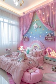 a bedroom decorated in pink and blue with unicorns on the bed, lights hanging from the ceiling