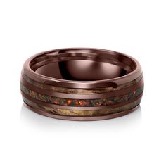 a wedding band that has been made with wood and copper inlaying the center