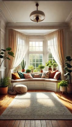 a living room filled with lots of furniture and plants on the window sill next to a rug