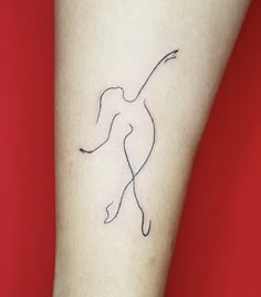 a woman's arm with a small tattoo on the left side of her leg