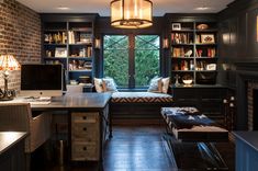 a living room filled with furniture and a fire place