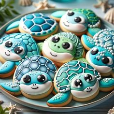 cookies decorated like sea turtles on a plate