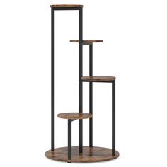 the three tiered shelf is made out of wood and black metal, with two shelves on each side