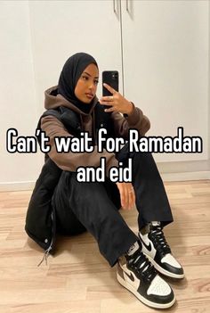 a woman sitting on the floor with her cell phone in her hand and texting can't wait for ramaan and eid