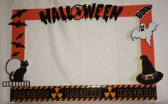 a photo frame decorated with halloween decorations