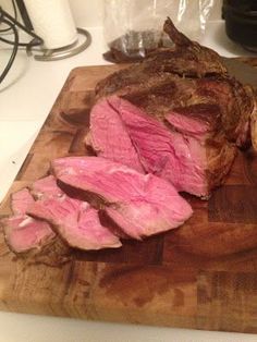 the meat is cut up and ready to be cooked on the cutting board for dinner