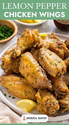 lemon pepper chicken wings on a white plate