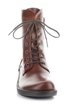 The perfect meld of classic style and contemporary comfort, this burnished-leather lace-up boot has an easy-on and easy-off side-zip closure. 1 3/4" heel; 1/2" platform (size 39) 6 1/2" shaft Lace-up style; side zip closure Removable insole Leather upper/textile lining/rubber sole Made in Portugal Women's Shoes Basic Wardrobe, Leather Lace Up Boots, Fly London, Leather Boots Women, Leather Boot, Wardrobe Basics, Leather Lace, Brown Boots, Up Styles