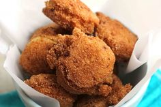 some fried food is in a white bowl