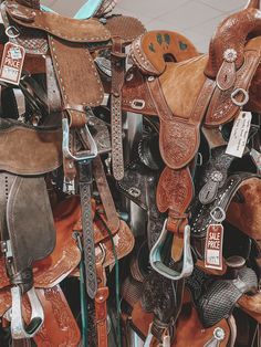 many different types of saddles for sale