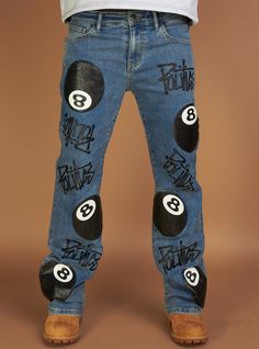 These baggy wide-leg heavy denim jeans feature a bold 8-ball screen print, blending streetwear edge with retro vibes. The relaxed fit and sturdy fabric ensure both comfort and durability, making them a standout piece for any casual wardrobe. Perfect for those who love to make a statement with their style. Street Wear Jeans Men, Cricut Jeans, Jeans Design Ideas Men, Paint Pants Ideas, Stud Fashion Outfits, Custom Pants Ideas, Painted Jeans Diy, Streetwear Fashion Design, Custom Denim Jeans