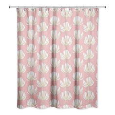 a pink shower curtain with white flowers on the outside and light green leaves on the inside