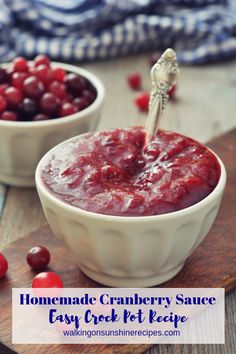 homemade cranberry sauce in two bowls on a cutting board