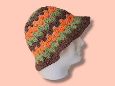 These handmade crochet bucket hats are 70s inspired and made with 100% cotton yarn. Cotton is machine washable, however with any cotton some shrinkage may occur in hot water or dryer. To prevent this either handwash/machine wash in cold water and lay flat to dry. The cotton blend is light and breathable so these hats are wonderful in the spring and summer! Retro Crochet Bucket Hat For Vacation, Brown Crochet Hat For Festivals, Retro One Size Bucket Hat For Beach, Retro One-size Bucket Hat For Beach, Retro Spring Bucket Hat, Retro Orange Bucket Hat, Retro Crochet Bucket Hat For The Beach, Vintage Crochet Beach Hat, Brown Crochet Bucket Sun Hat