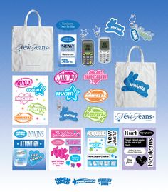 various stickers and decals are displayed on a white bag with blue sky in the background