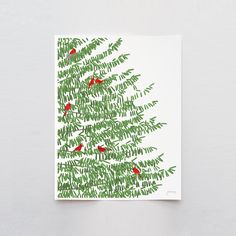 a christmas tree with red birds on it