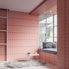 a room with pink walls and white flooring