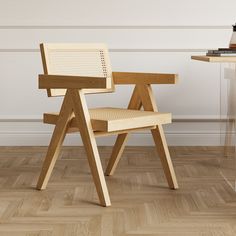 a wooden chair sitting on top of a hard wood floor