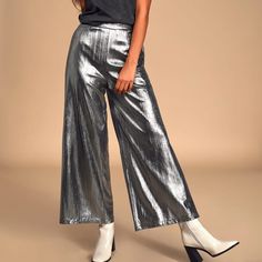 -Silver Metallic Wide Leg Cropped Pant -High Waisted -95% Polyester/5% Spandex -Brand New Never Worn! Metallic Shiny Bottoms For Party Season, Metallic Shimmer Disco Pants, Metallic Shimmer Pants For Party Season, Glamorous Pants With Sheen For Night Out, Glamorous Sheen Pants For Night Out, Glamorous Sheen Bottoms For Night Out, Glamorous Metallic Bottoms With Sheen, Silver Shimmer Pants For Party, Full Length Silver Bottoms For Party