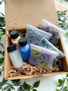 a box filled with lots of different types of soaps