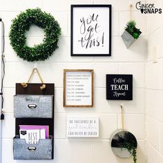 the wall is decorated with various items and signs for teachers to use on their desks