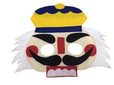 a white mask with a yellow crown on top