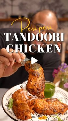 a man is eating some food on a plate with the words tandoori chicken