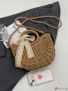 Bird in Bag - Stylish Rattan Weave Beach Bag: A Perfect Blend of Fashion and Functionality Beige Jute Bags For Beach Season, Straw Crossbody Bags For Beach, Beige Handheld Crochet Bag For Vacation, Bohemian Brown Bags For Spring, Beige Braided Tote Bag, Vacation Straw Pouch Bag With Adjustable Strap, Straw Pouch Bag With Adjustable Strap For Vacation, Braided Tote Bags For Beach Season, Straw Crossbody Shoulder Bag For Beach