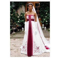 a woman in a white and red wedding dress