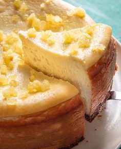 a close up of a cake on a plate with a slice taken out of it