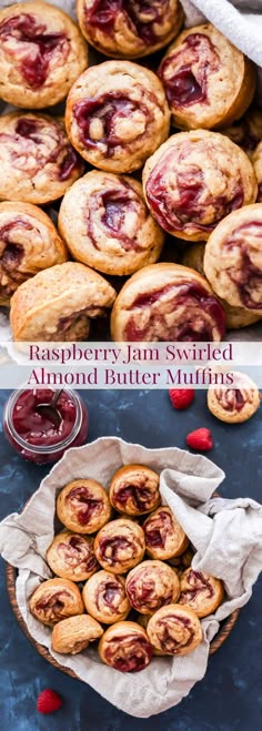 raspberry jam swirled almond butter muffins on a blue table with the title above it