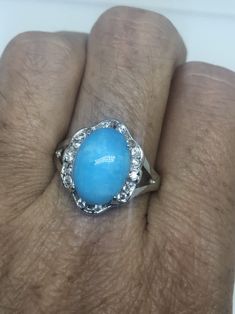 Large genuine aqua blue Larimar Vintage ring Low content silver not sterling. Size 9 My jeweler can re size it for a $10-$20 fee All rings are shipped in a nice gift box. Check out our over a THOUSAND great reviews Engraving is $4 per letter and is not always perfect depending on the piece. It can take a few days if the jeweler is busy. This is payable to Paypal Judithsltd@gmail.com Hallmarked Aquamarine Jewelry For Anniversary, Blue Turquoise Ring Stamped 925 For Anniversary, Stamped 925 Turquoise Ring For Anniversary, Fine Jewelry Blue Turquoise Ring For Anniversary, Blue Larimar Round Rings, Elegant Blue Larimar Rings, Light Blue Oval Jewelry For Gift, Oval Light Blue Jewelry For Gift, Blue Turquoise Ring Stamped 925 For Promise