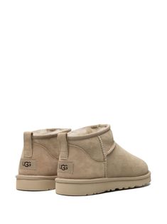 Find UGG Classic Ultra Mini Suede Boots on Editorialist. beige leather/wool appliqué logo round toe pull-tab at the heel slip-on style signature UGGplush™ lining rubber sole EVA outsole Uggs Classic Mini Outfit, Beige Uggs, Coastal Closet, Uggs Classic Mini, Uggs Ultra Mini, Ugg Beige, Uggs Mini, Ugg Ultra Mini, Wool Appliqué