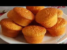 a white plate topped with muffins on top of a table