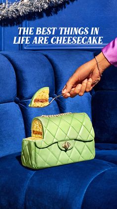 a woman is holding a green purse with food in it and the caption reads, the best things in life are cheesecake