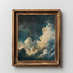 the painting is hanging on the wall in front of the white wall and it looks like clouds are coming out of the sky