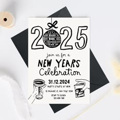 a new year's eve celebration card with a black and white design on it