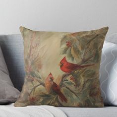 a painting of two red birds on a branch with berries and leaves throw pillow by artdeco